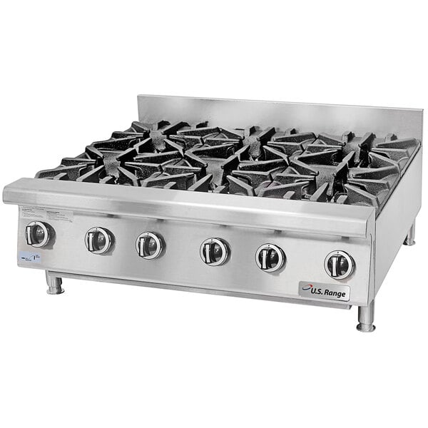 A U.S. Range stainless steel liquid propane countertop range with 6 burners.