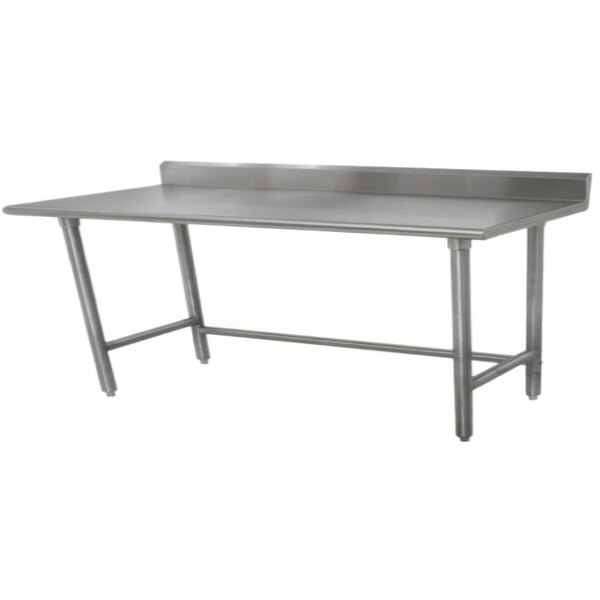 An Advance Tabco stainless steel work table with a backsplash on a white surface.