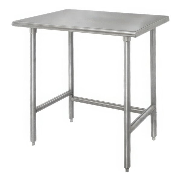 An Advance Tabco stainless steel work table with galvanized legs.