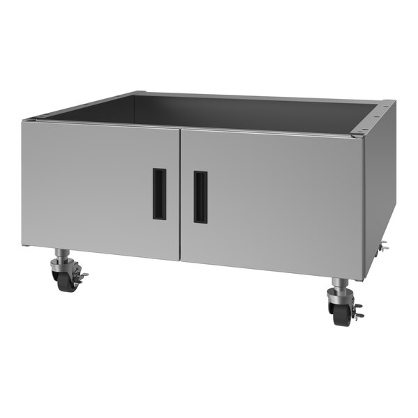 A stainless steel charbroiler cabinet with double doors and casters for mobility.