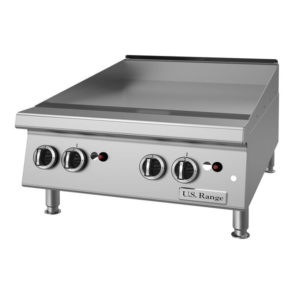 A stainless steel 24-inch natural gas countertop griddle with thermostatic controls and four control knobs.