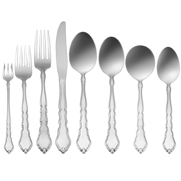 A close-up of a Oneida Satinique stainless steel salad/pastry fork.