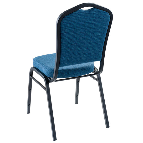 A blue National Public Seating stackable chair with black metal legs.