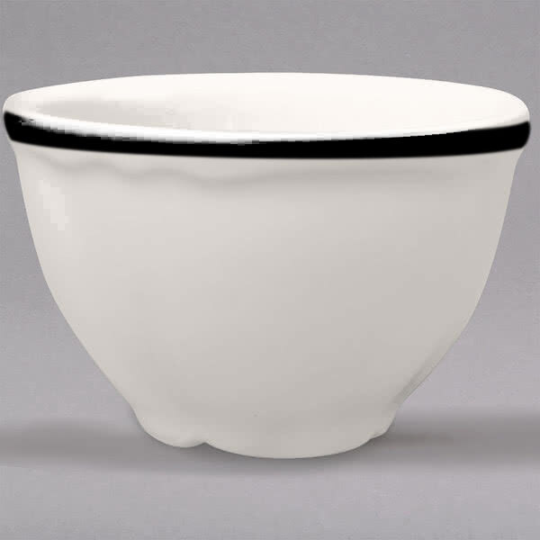 A white bowl with a black rim.