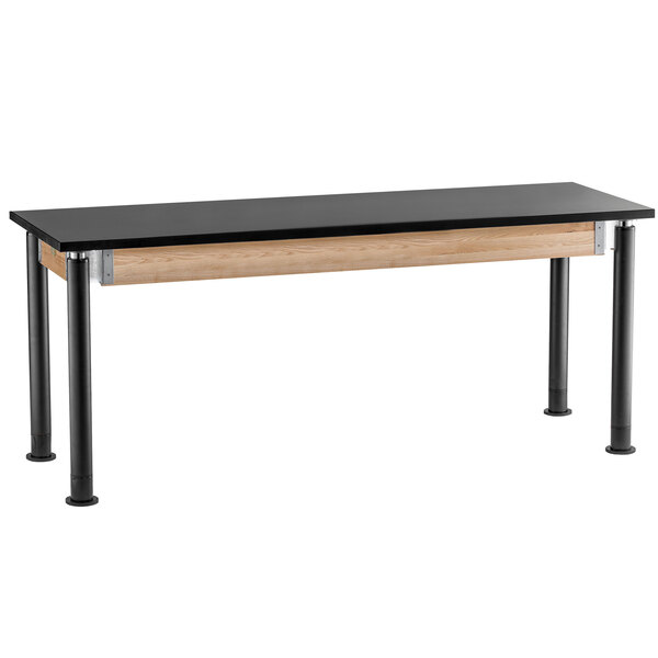 A National Public Seating science lab table with a black top and black steel legs.