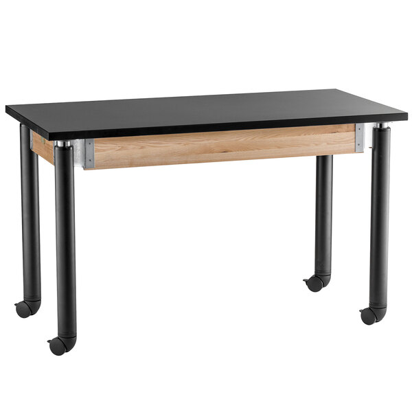 A black and wood science lab table with wheels.