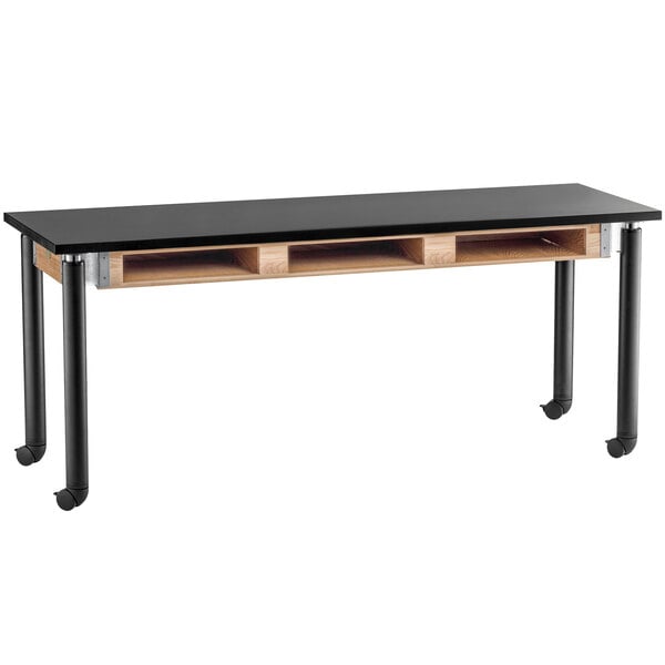 A black National Public Seating science lab table with black legs.
