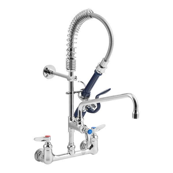 A T&S low profile wall mounted pre-rinse faucet with hose and swivel sprayer.