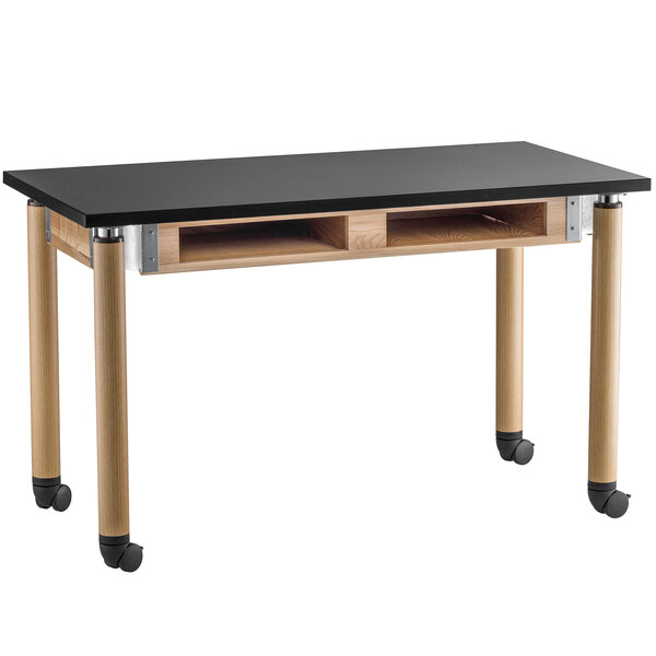 A black and wood National Public Seating science lab table with wheels.