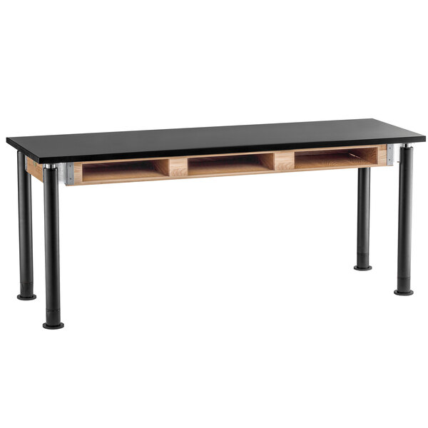 A black science lab table with black legs.