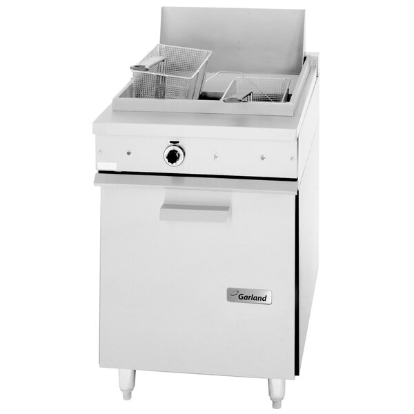 A white Garland electric floor fryer with a black handle and a basket.