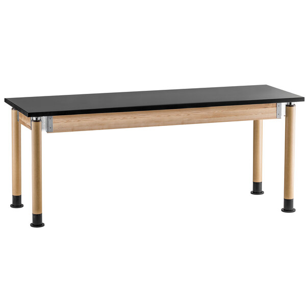 A black and wood National Public Seating science lab table.