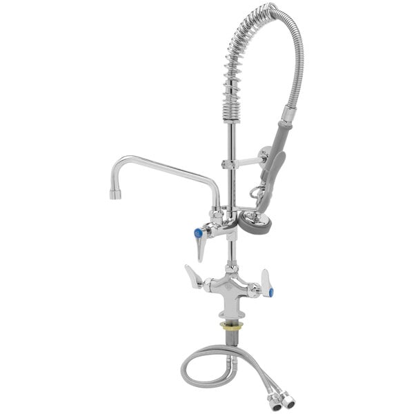 A T&S low profile deck mounted pre-rinse faucet with a hose.