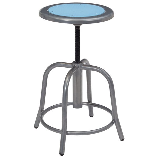 A metal lab stool with a blue seat.