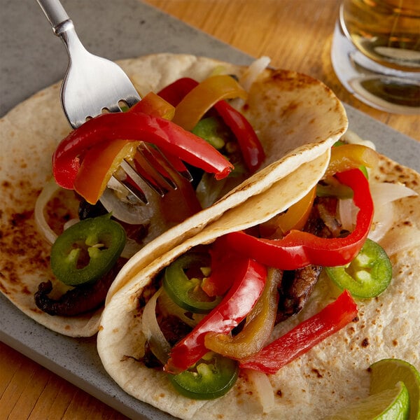 a fork with peppers on it