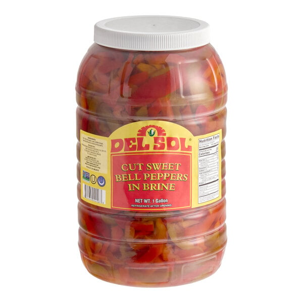 A large plastic jar of Del Sol cut sweet bell peppers in brine.