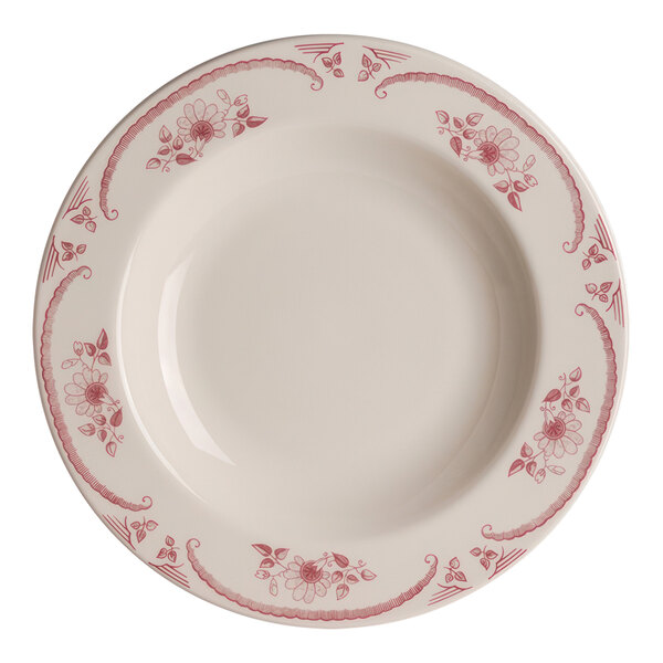An ivory china pasta bowl with red flowers on it.