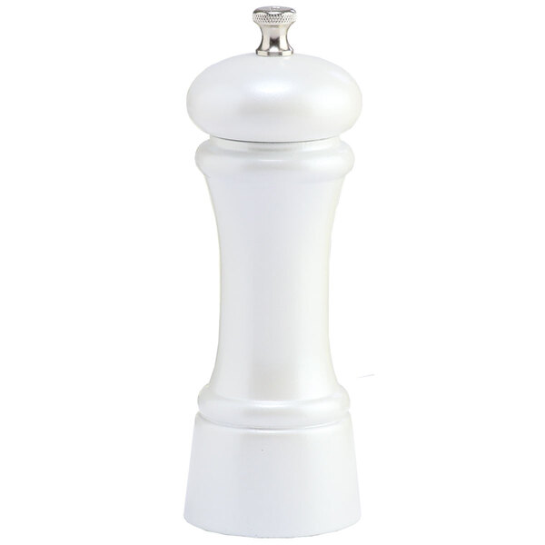 A white pepper mill with a silver top.