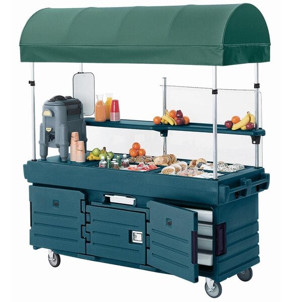 A Cambro vending cart with a green canopy.