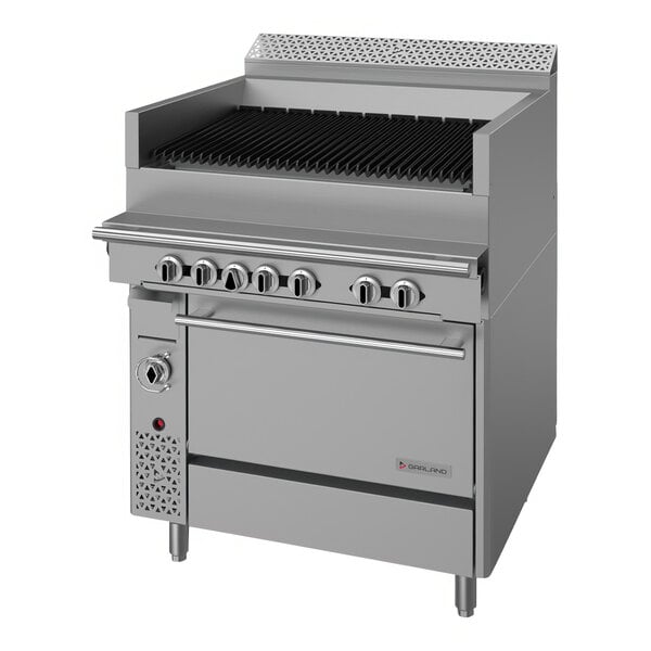 A large stainless steel Garland natural gas charbroiler with convection oven base.