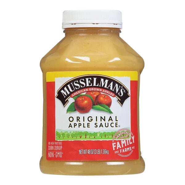 A plastic bottle of Musselman's Original Sweetened Applesauce.