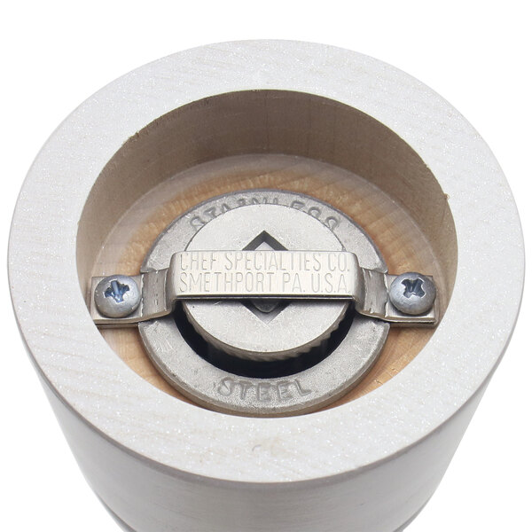 A wooden cylinder with a metal ring on top, a Chef Specialties Elegance Pearl Metallic pepper mill.