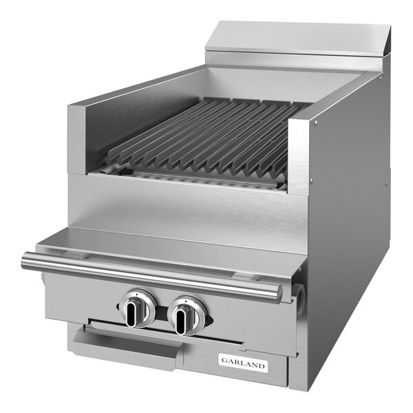 A stainless steel commercial countertop charbroiler with two control knobs and a slotted grilling surface.