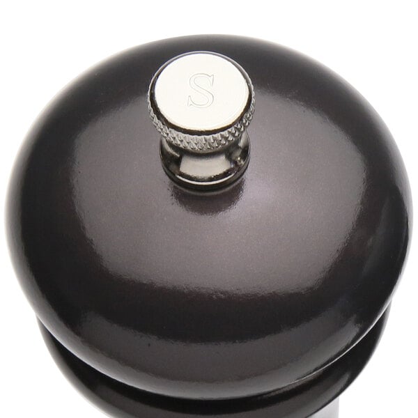 A Chef Specialties Elegeance gunmetal pepper mill with a silver top.