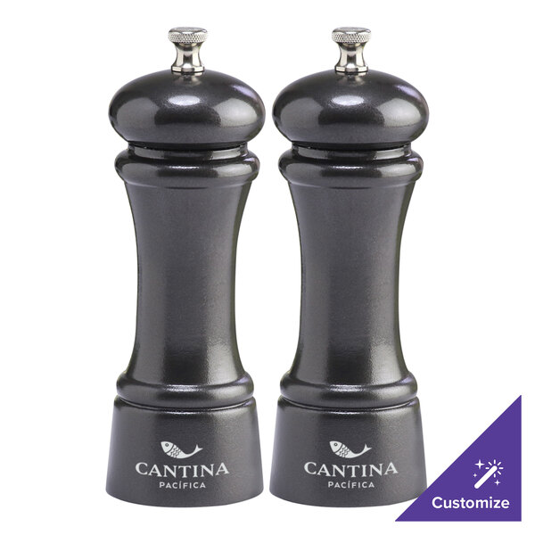 A black gunmetal Chef Specialties pepper mill and salt mill set.