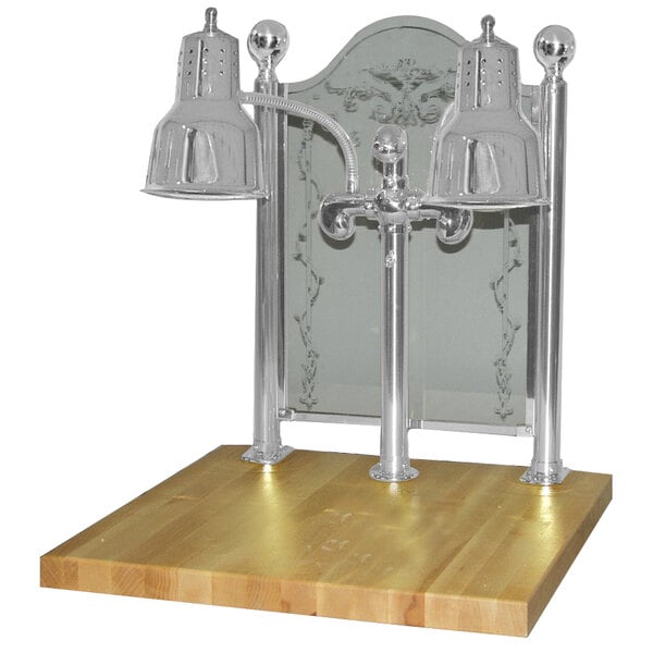 A Hanson Heat Lamps stainless steel carving station with maple base on a wooden surface.