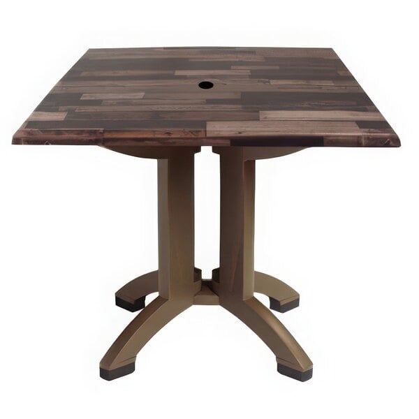 A square wood table with a hole in the top.