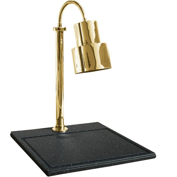A brass Hanson Heat Lamp with gold trim on a black synthetic granite base.