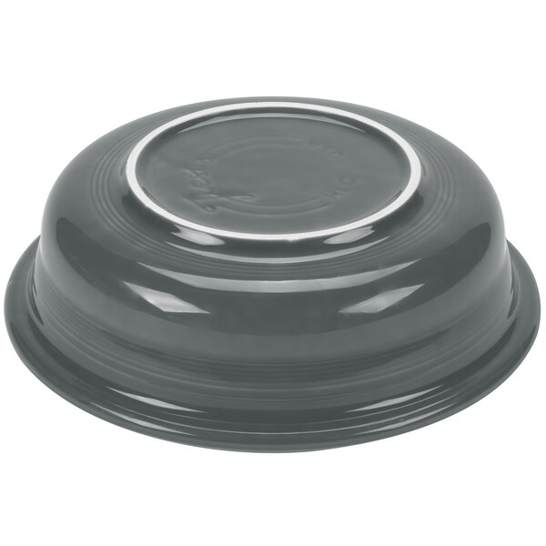 A grey bowl with a white rim.