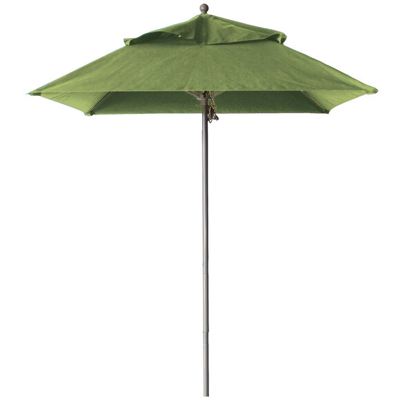 A Grosfillex pistachio green fiberglass umbrella on an aluminum pole.