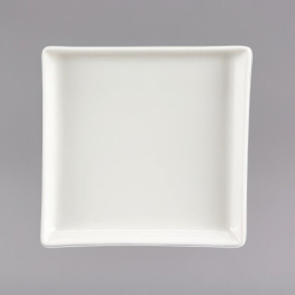 A white rectangular china appetizer tray.