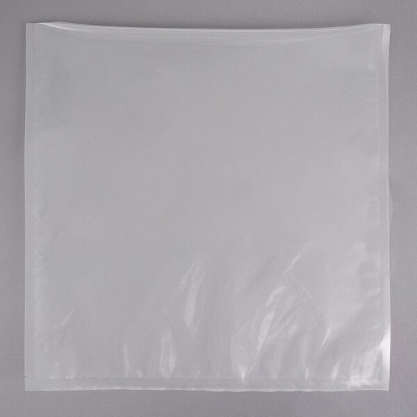 A close-up of a white VacPak-It chamber vacuum packaging bag with a zipper.