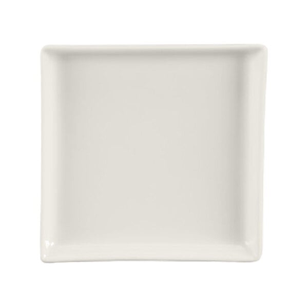A plain, square, ivory-colored ceramic tray with slightly raised edges.