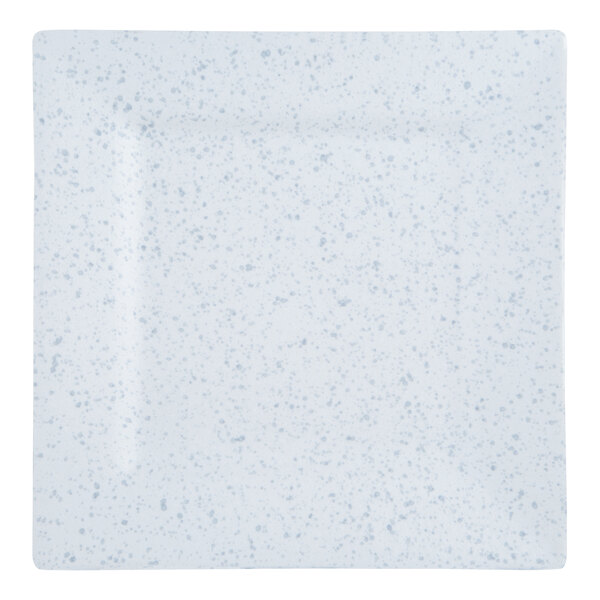 A blue speckled, square porcelain dinner plate.
