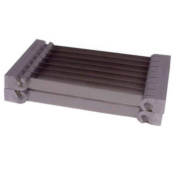 A close-up of a metal piece with four rows of bars.