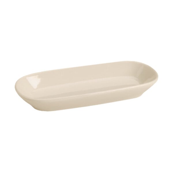 A rectangular, shallow, ivory-colored ceramic plate with rounded corners.