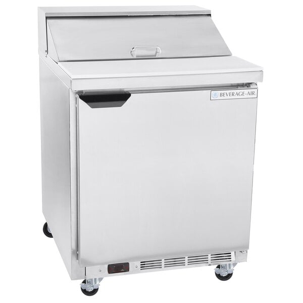 A silver Beverage-Air refrigerator with a lid open.