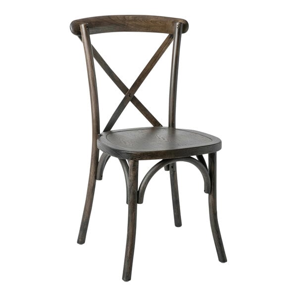 A dark wooden chair with a curved backrest, X-shaped back support, and slightly curved legs.