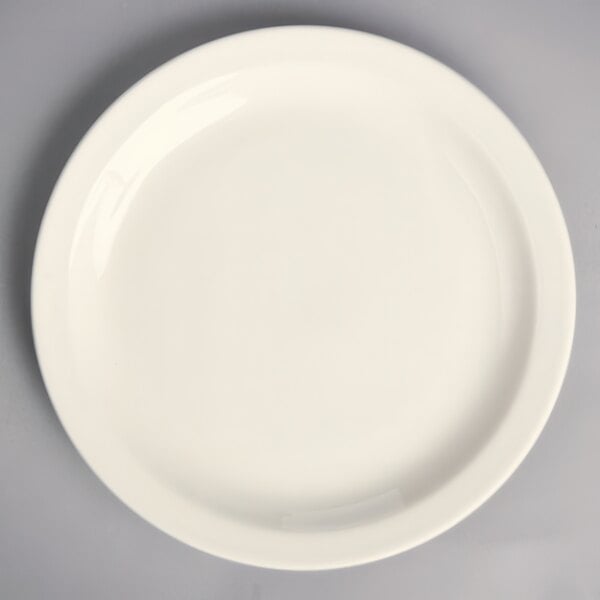 A white Homer Laughlin china plate with a white rim.