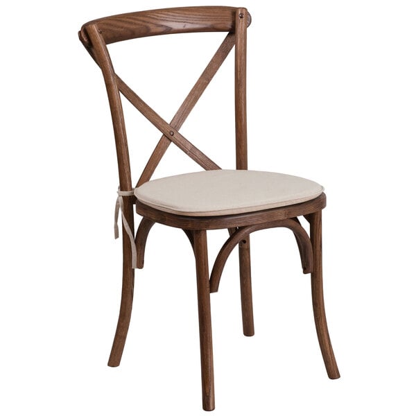 A Flash Furniture wooden banquet chair with a white cushioned seat.