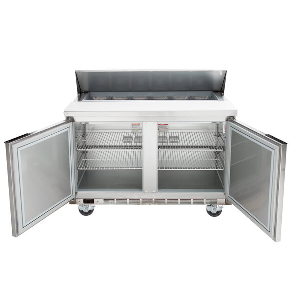 A Beverage-Air stainless steel commercial refrigerator with two doors open.