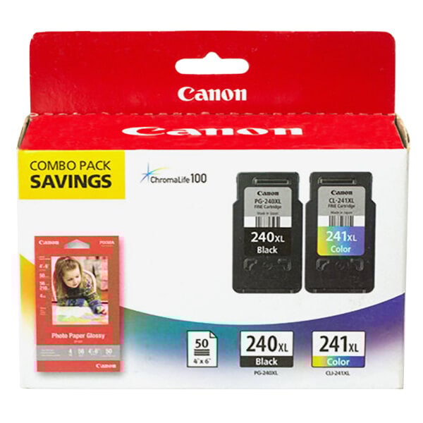 A box of Canon black and tri-color ink cartridges with paper.