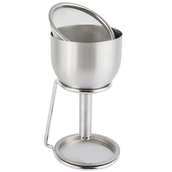 A Franmara stainless steel decanter funnel set on a table stand with a sieve.