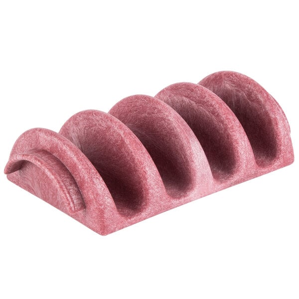 A pink polyethylene taco server with four shell-shaped holders.