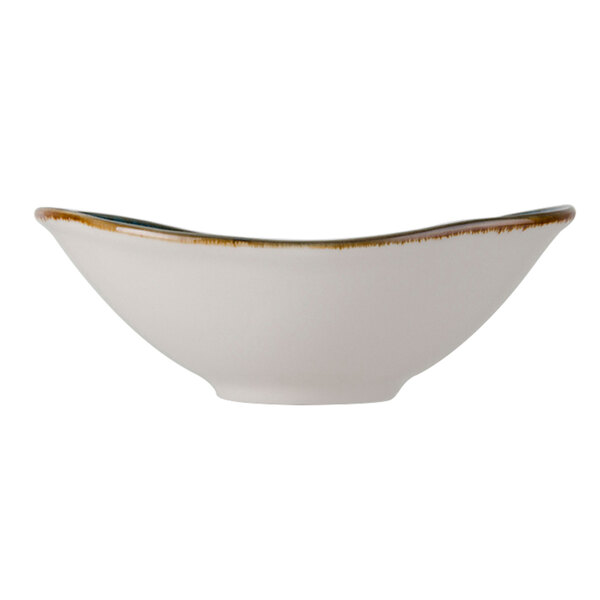 A white Tuxton Capistrano bowl with a brown rim.