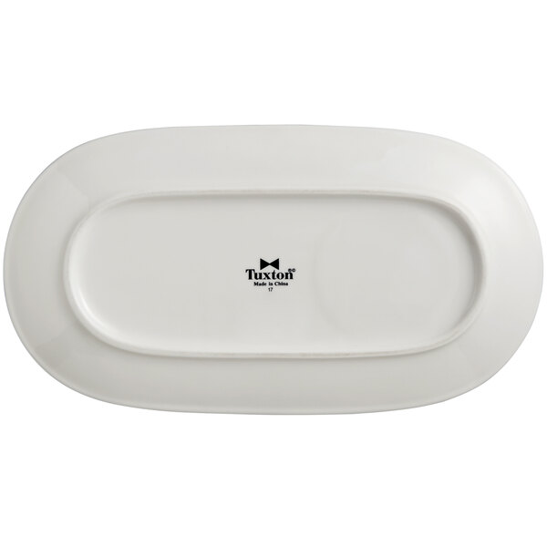 A white rectangular platter with a black logo.